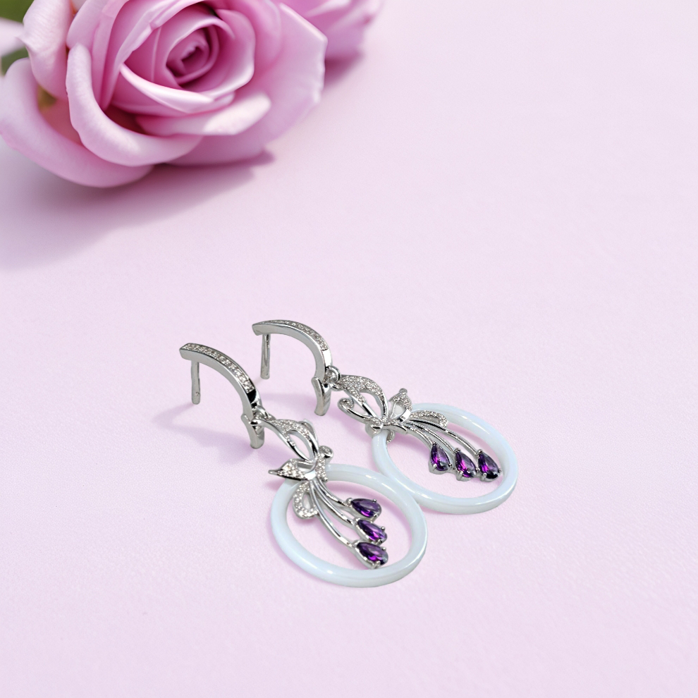 petal drift earring– sterling silver romantic motion