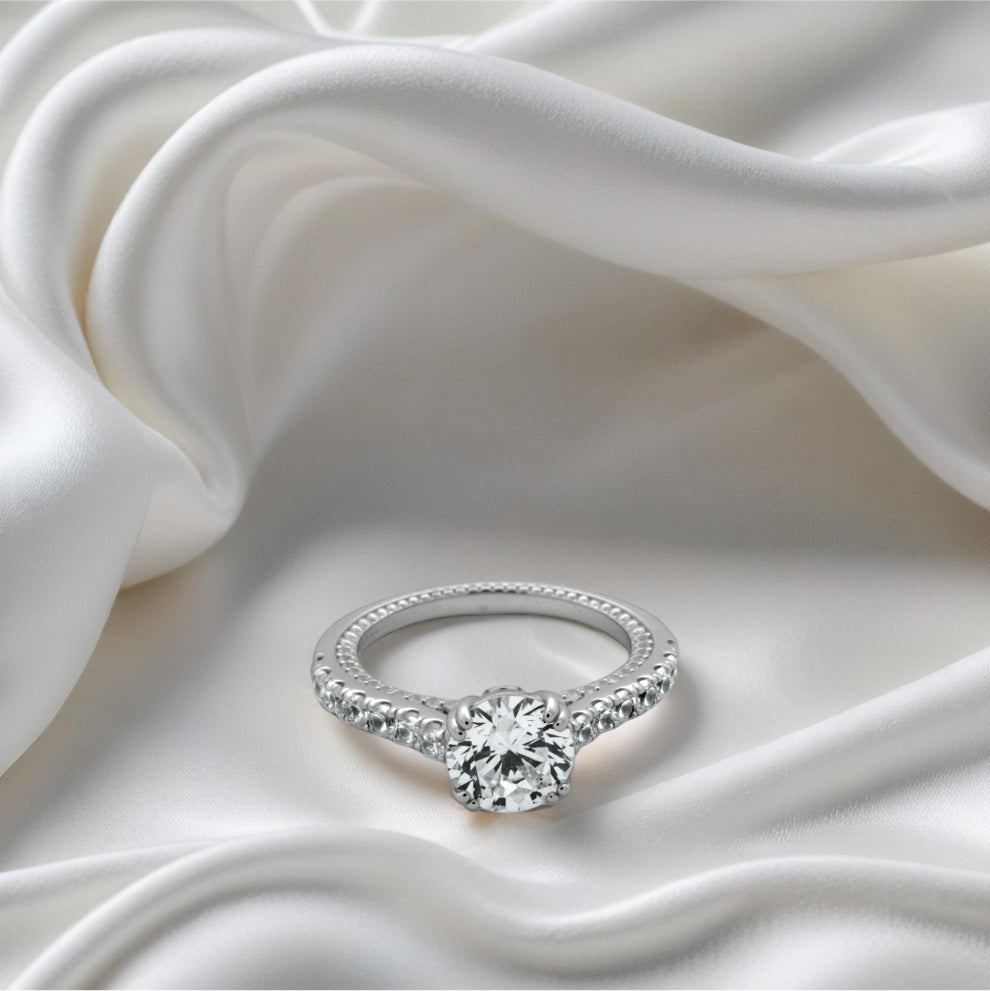 celeste solitaire ring – sterling silver with classic sparkle