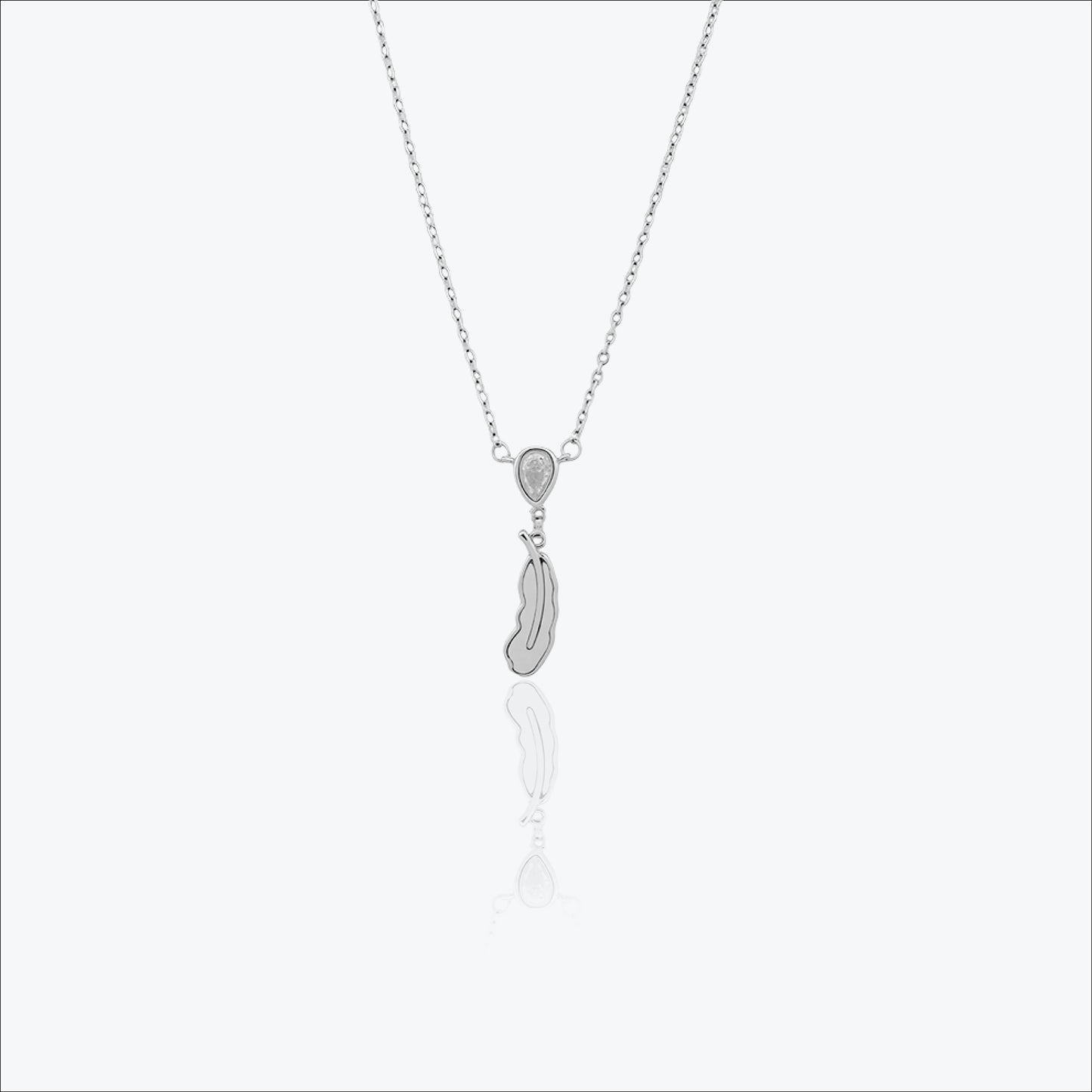 luma feather pendant – sterling silver – rubicstone
