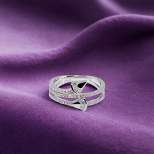 Silver ring with diamond accents 