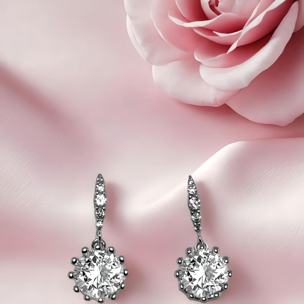 radiant drop earring– sterling silver in timeless motion