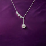 Silver pendant with diamonds and pearl