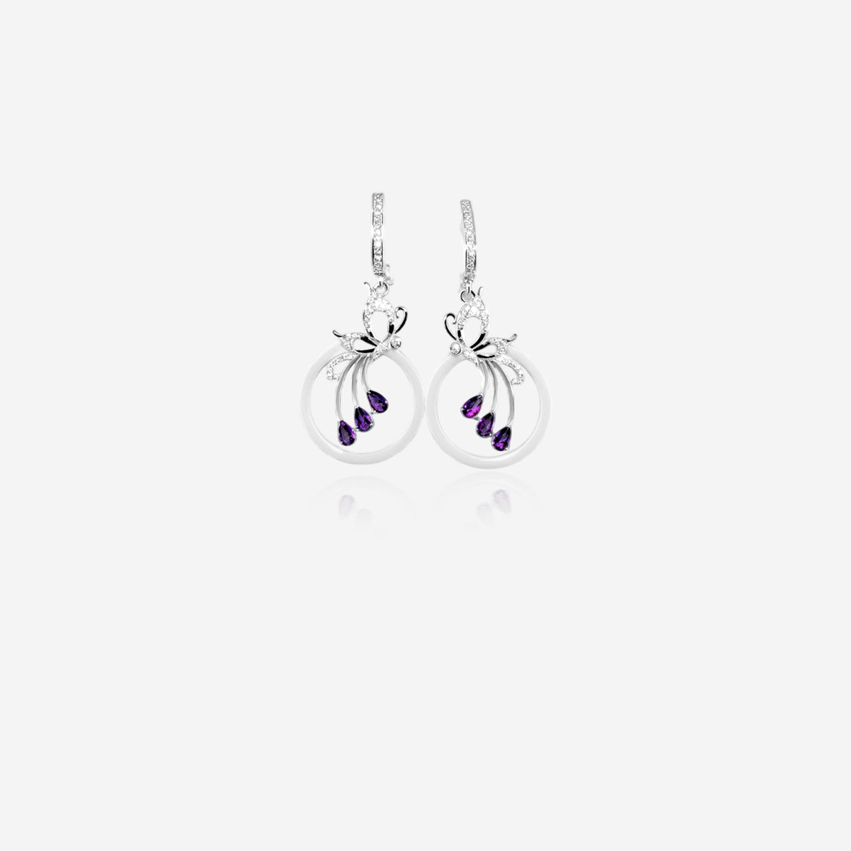 Pair of silver earrings with purple stones 