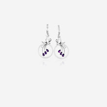Pair of silver earrings with purple stones 
