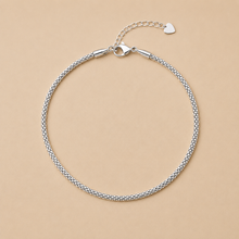 Classic silver charmed anklet in silver