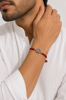 Silver Shivling Sacred Rakhi with Red Thread