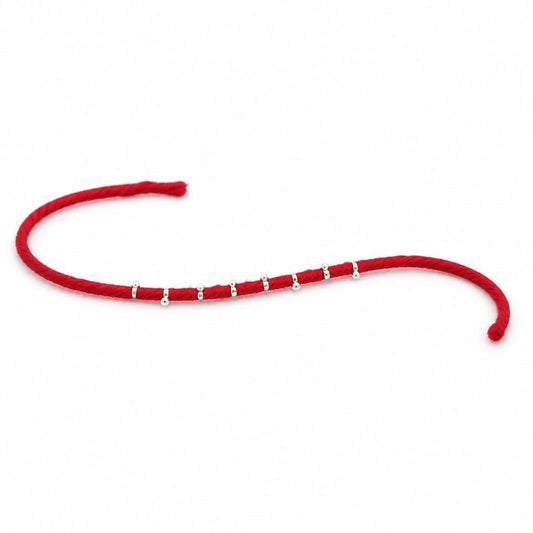 Silver Pearl Thread Rakhi – Elegant Festive Charm