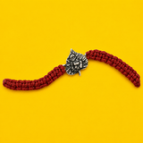 Divine Krishna Leaf Silver Rakhi with Red Thread