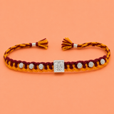 Divine Ganesha Silver Rakhi with Handwoven Thread