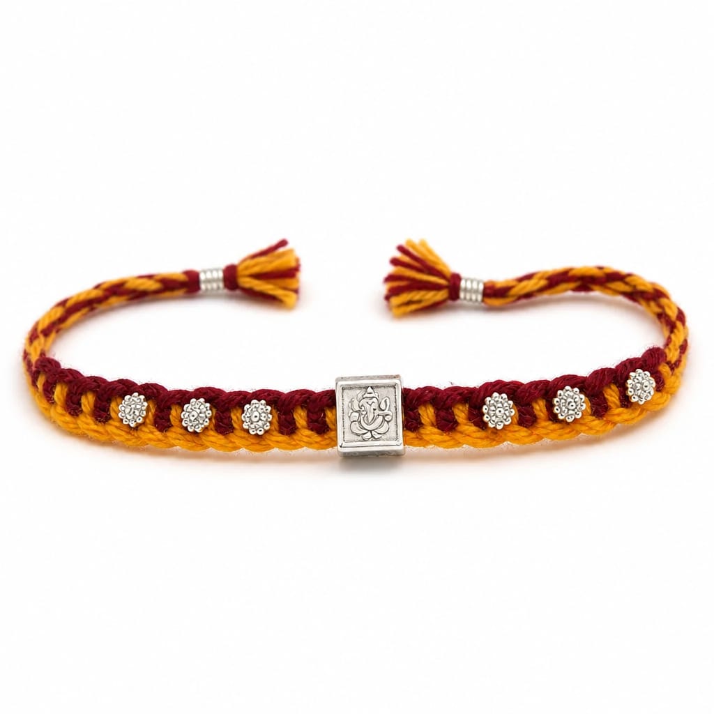 Divine Ganesha Silver Rakhi with Handwoven Thread