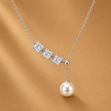 Silver pendant with diamonds and pearl
