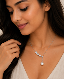 Silver pendant with diamonds and pearl