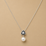 Pearl drop pendant with black triangle