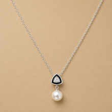 Pearl drop pendant with black triangle