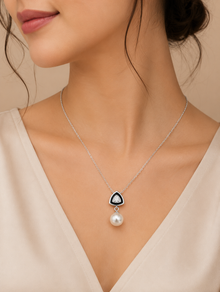 Pearl drop pendant with black triangle