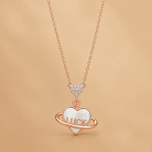 Heart patterned women`s pendant in rose gold
