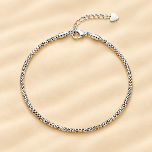 Classic silver charmed anklet in silver