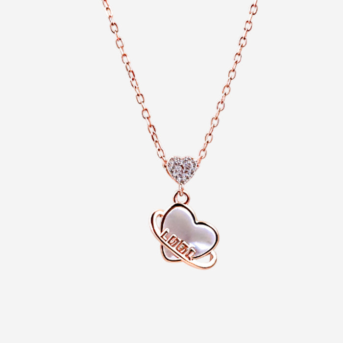 Heart patterned women`s pendant in rose gold