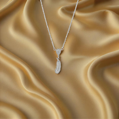 Luma Feather Pendant – Sterling Silver – Rubicstone