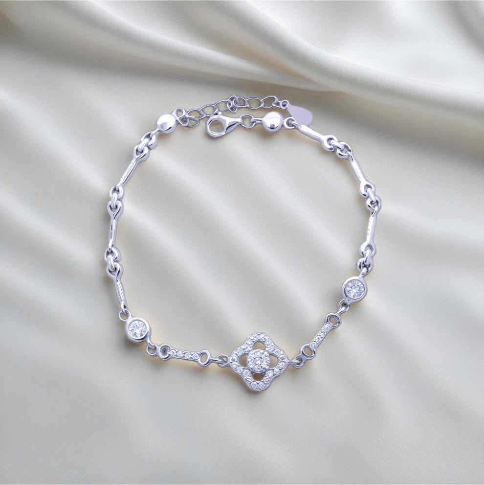 Floral Radiance Bracelet – Sterling Silver with Intricate Elegance