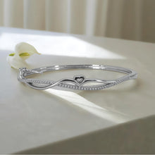 Ebb & Heart – Sterling Silver Flowing Elegance