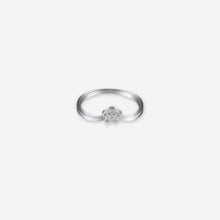 Silver ring with a floral design