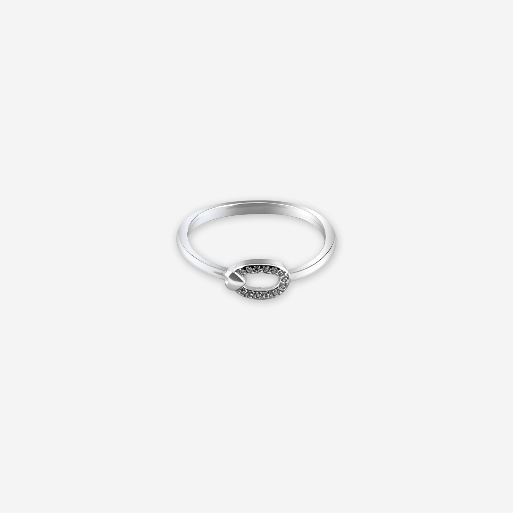 Silver ring with a small circular design on a white background
