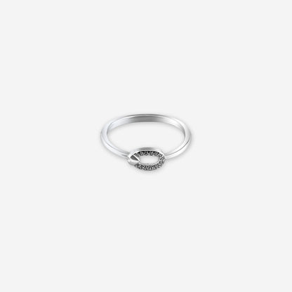 Silver ring with a small circular design on a white background