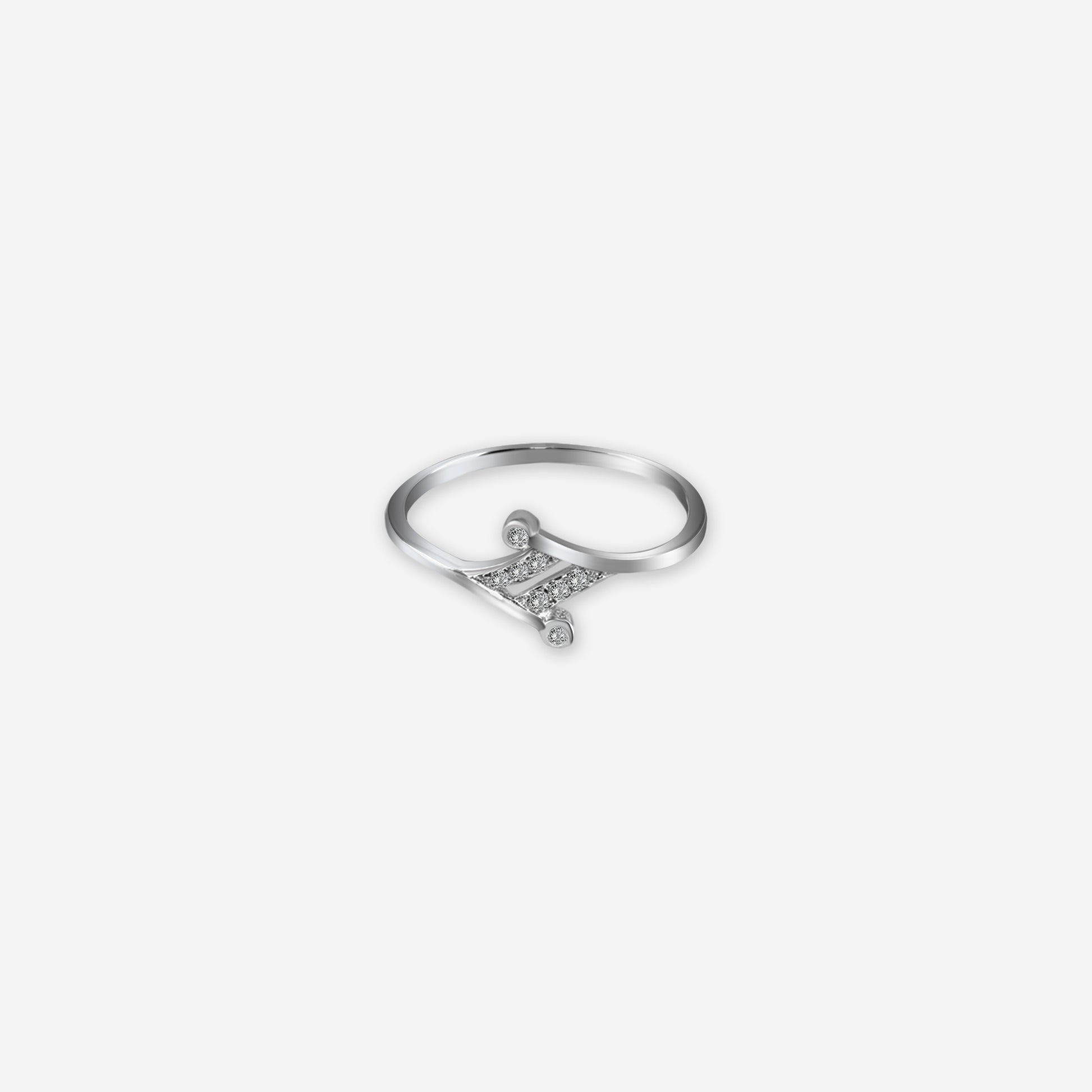 Silver ring with a small diamond on a white background